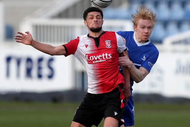 Luke Williams of Hartlepool United and Kane Ferdinand of Woking during the Vanarama National League match between Hartlepool United and Woking at Victoria Park, Hartlepool on Saturday 20th March 2021. (Credit: Chris Booth | MI News)
