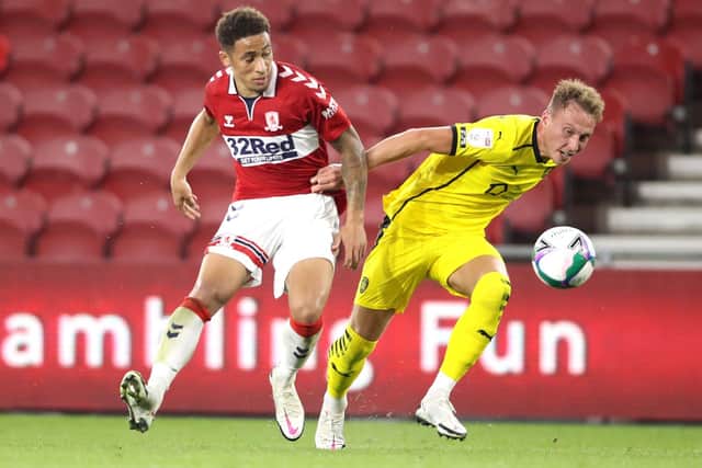 Middlesbrough's Marcus Tavernier challenges for the ball against Barnsley.