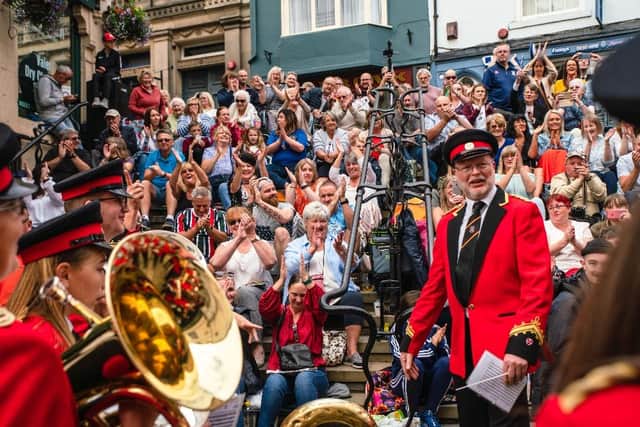 Crowds enjoy brass band music at Magdalene Steps in 2019.