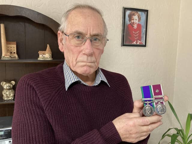 Richard Lee with his medals he plans to hand in to Downing Street in protest at the handling of his daughter Katrice's case.