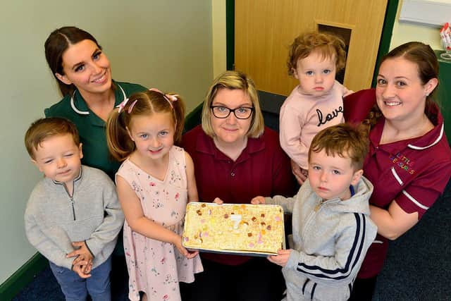 Nursery manager Claire Wainwright (centre) with staff  Goodacher (left) and Jordan Kennedy and children (left to right) Edward Smith, Ava Hurst, Olivia Keenan Abel Harwood at the birthday party.
