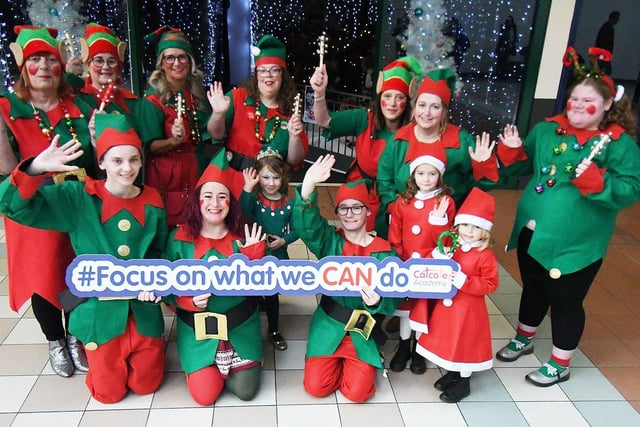 Santa's Elves from Catcote Academy greeting Santa on his arrival at Middleton Grange Shopping Centre. Picture by FRANK REID