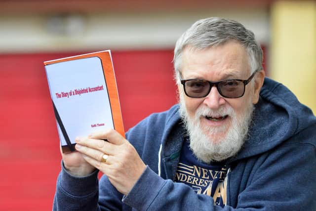 Keith Thomas with a copy of his book The Diary of a Disjointed Accountant. Picture by FRANK REID