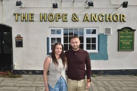 Scott Standing and Danielle Creswell outside the Hope and Anchor pub.