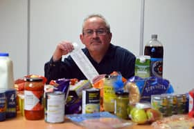 Kevin Clark shows how much food he has bought after spending £30.