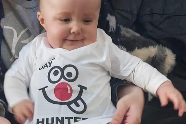 Ten-month-old Hunter is doing his bit in a customised Red Nose Day t-shirt.