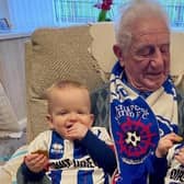 Ronnie Taylor, 89, with his two great-grandsons Locke, left, and Finn. right.