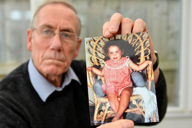 Richard Lee, 71, with a photograph of his daughter Katrice aged 18months. 

Picture by FRANK REID