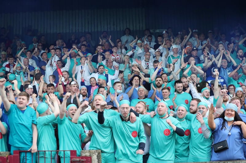 With no fancy dress theme 2020 and 2021 because of the pandemic, Pools fans saluted the NHS in 2022 at Scunthorpe United by dressing up in medical outfits.
