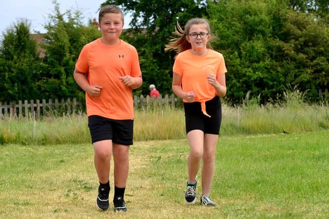 St Aidan's Primary school pupils Logan Marshall and Millie Sowerby taking part in the charity run in memory of fellow pupil Keisha Watson.