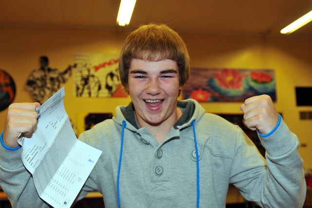 Manor College of Technology pupil David Simpson celebrates his GCSE exam results in 2011.