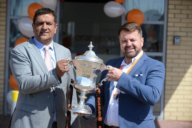 Orangebox Training Soutions CEO Simon Corbett and Hartlepool United chairman Raj Singh.
