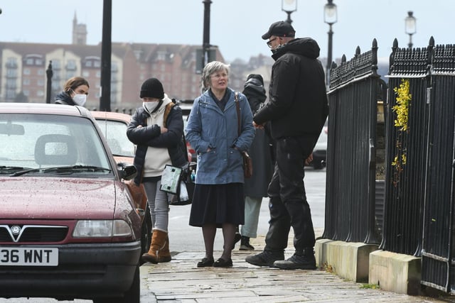 The actress is pictured during filming in the South Crescent area of the Headland.