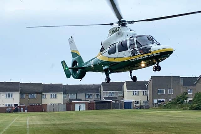The Great North Ambulance taking off from the playing field of St. Helen's Primary School. Picture by Frank Reid