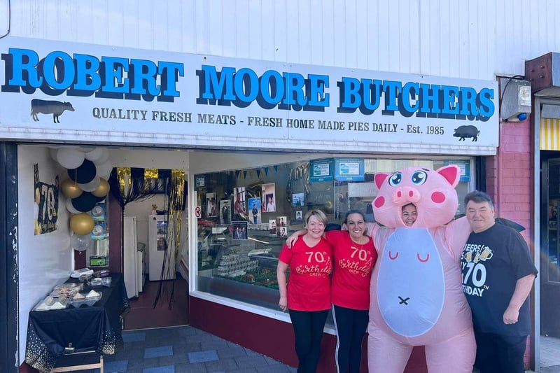 Robert Moore, of Robert Moore's Butchers, was visited by an inflatable pig who wished him a happy birthday and sang him a special birthday song.