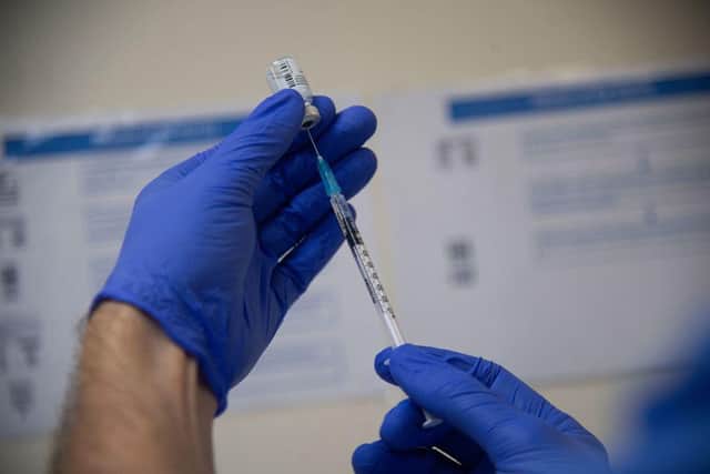 Latest figures show that more than 50 million doses of coronavirus vaccine have now been given in England. (Photo by CRISTINA QUICLER/AFP via Getty Images)