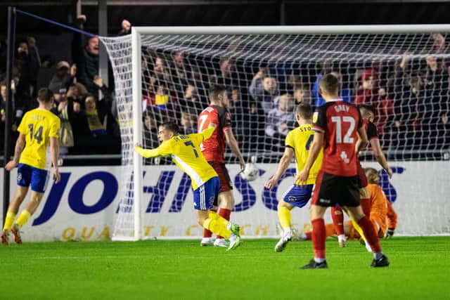 Joe Sbarra celebrates scoring his side's second goal of the game during the FA Cup match between Solihull Moors and Hartlepool United at Damson Park2. (Credit: Gustavo Pantano | MI News)
