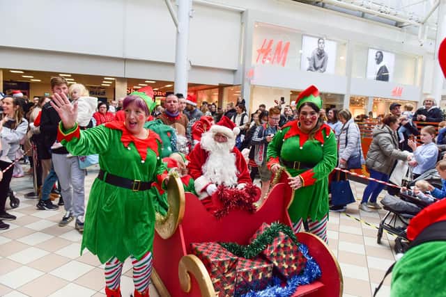 Santa arriving at Middleton Grange Shopping Centre last year.