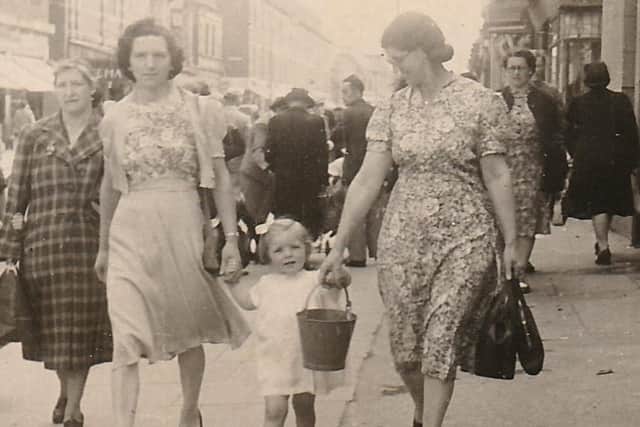 Patricia Anne Hepplewhite on a shopping trip with her mother.
