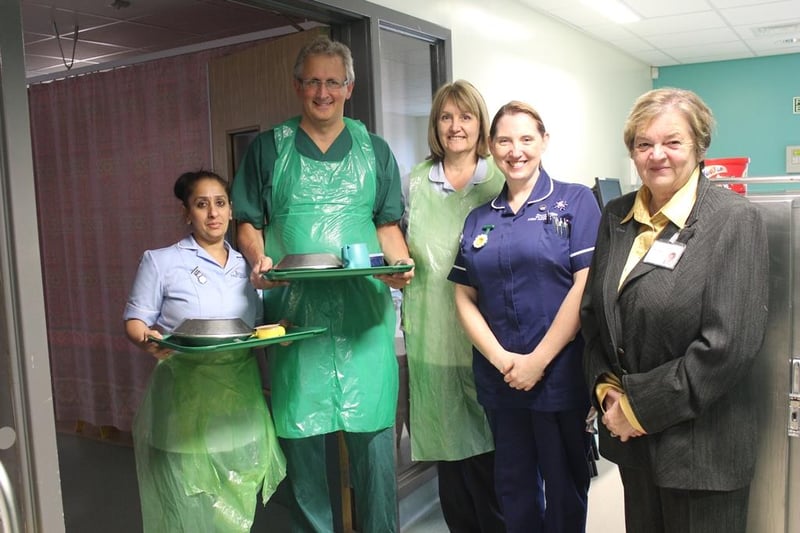 High Peak MP Andrew Bingham spent a day volunteering at Stockport's Stepping Hill Hospital last week  He is pictured with Carol Prowse, the High Peak non executive director  for Stockport NHS Foundation Trust, and trust staff.