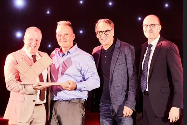 Dawson Landscapes win Marshalls Register Contractor of the Year. Left to right: Andrew Dawson, Stuart Dawson, ex-footballer Paul Merson, and Marshalls MD Ian Dean.