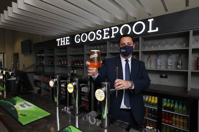 Mayor Ben Houchen pouring a pint in the new The Goosepool Bar