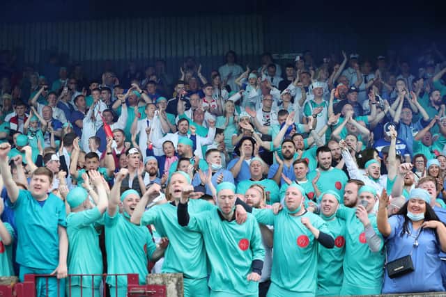Hartlepool United supporters gave tribute to the NHS heroes in their end of season fancy dress tradition at Scunthorpe United. (Credit: Mark Fletcher | MI News)