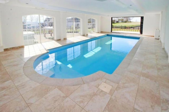 This stunning indoor pool has recently been refurbished and leads out onto the patio area outside.
