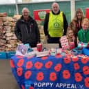 Hartlepool Rotary President Carol Menabawey together with fellow Rotarians and some young helpers in Asda.