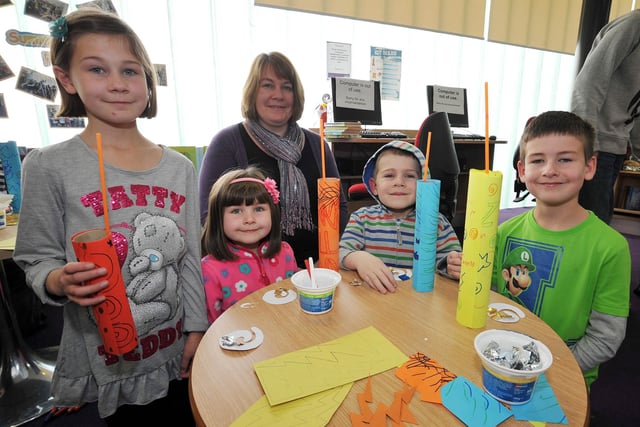 Firework model making as part of half term activities at Aston Library, pictured are the French family.