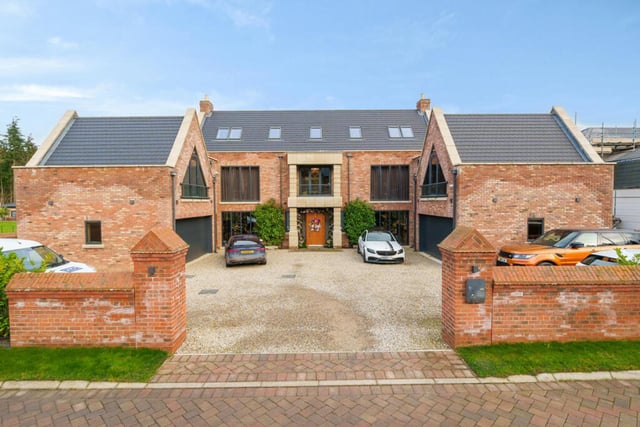 This large detached home has seven bedrooms and six bathrooms, and is currently on the market for £1.5million.