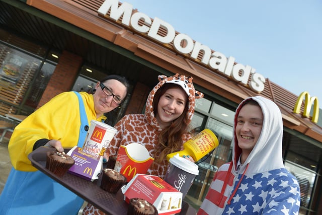 McDonalds Burn Road staff (left to right) Claire Todd, Kym Thomson and Craig Walton in their Onsie's for a charity event in 2015. Picture by FRANK REID