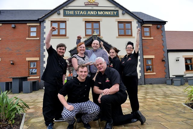 Rebecca and Gary Drake, general managers of the Stag and Monkey, celebrate their Hartlepool Mail Pub of The Year trophy alongside staff members Lewis Drake, Kieran Bradwell, David Hall, Rebecca Bates and Michelle Duffield in 2015.