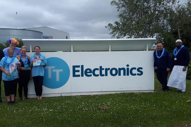 Workers at TT Electronics are backing the Colour Run.