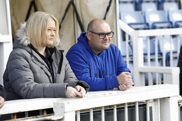 These two fans watch intently at pitchside. (Mark Fletcher/MI News).