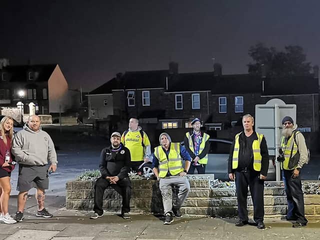 Volunteers pause for a photo on the Midnight Walk.