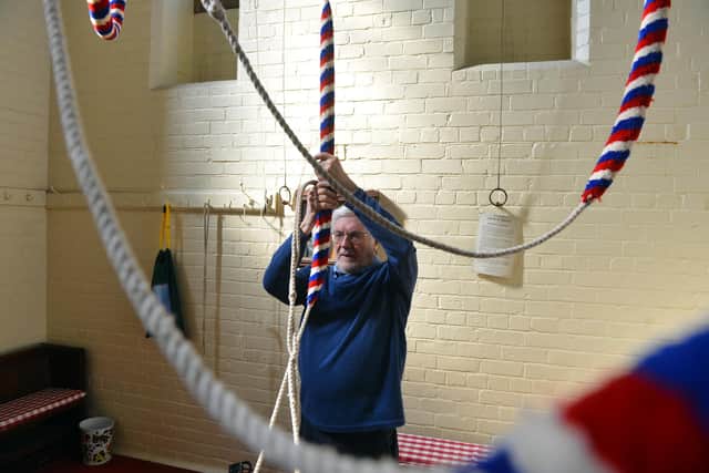 St Aidan's Church bellringer Andrew Frost prepares for Saturday's bell tolling to mark Prince Philip's funeral.