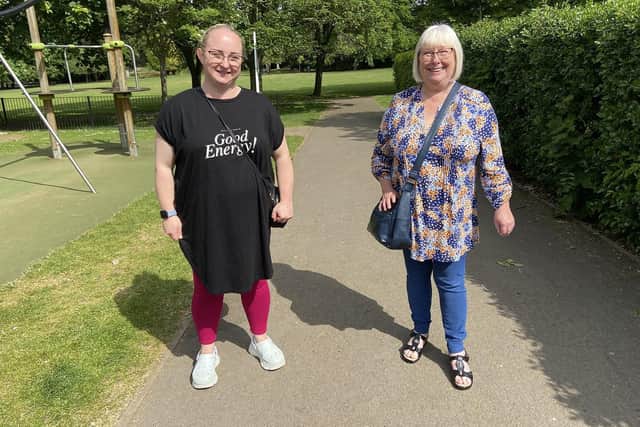 Janette Bates (left) and Christine Liddell make it back to The Place In The Park after completing the carers walk In the park event. Picture by FRANK REID