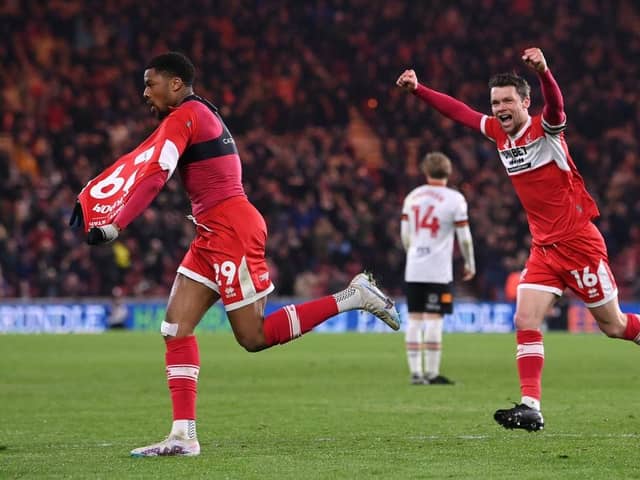 Middlesbrough player Chuba Akpom celebrates with Jonny Howson after scoring the third Boro goal during the Sky Bet Championship between Middlesbrough and Hull City at Riverside Stadium. (Photo by Stu Forster/Getty Images)