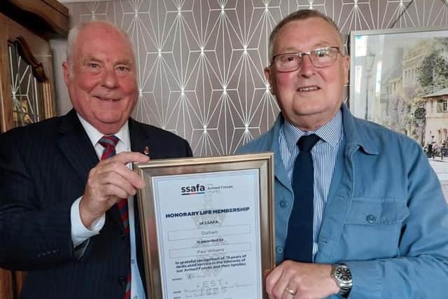 Paul Williams (right) receiving his Certificate of Honorary Life Membership of SSAFA Durham from branch president Mike Donne.
