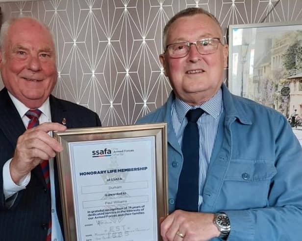 Paul Williams (right) receiving his Certificate of Honorary Life Membership of SSAFA Durham from branch president Mike Donne.