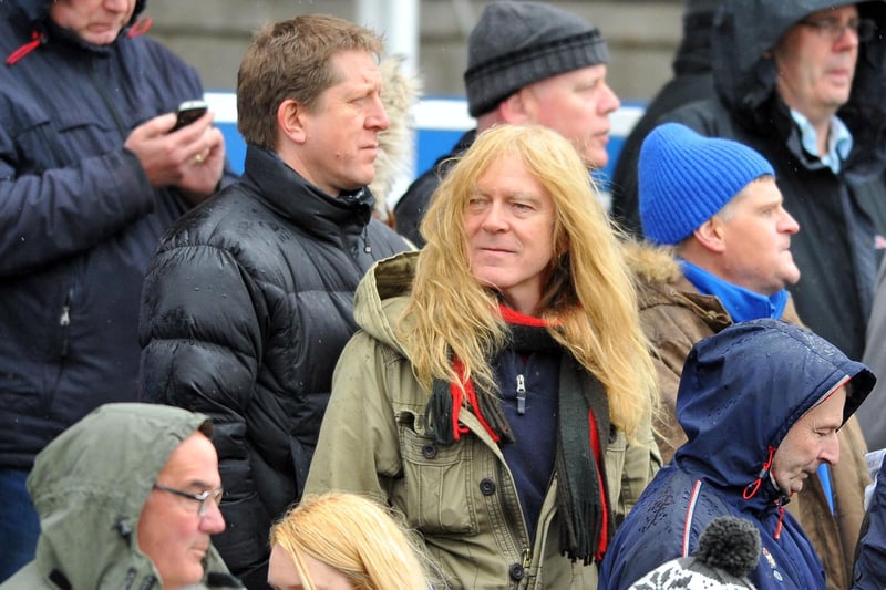 Born in 1957, the guitarist was part of Hartlepool heavy metal band White Spirit before joining Gillan and later rock legends Iron Maiden. As our picture shows, Gers, centre, still finds time to stand on the terraces watching his beloved Hartlepool United.