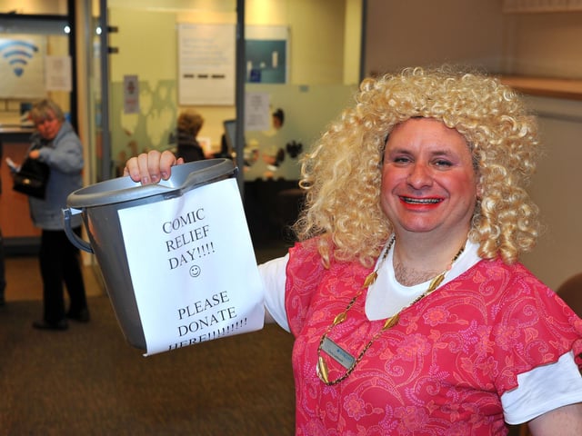 Barclays staff member, Chris Laybourn, dresses as a woman to raise funds for Comic Relief in 2013.