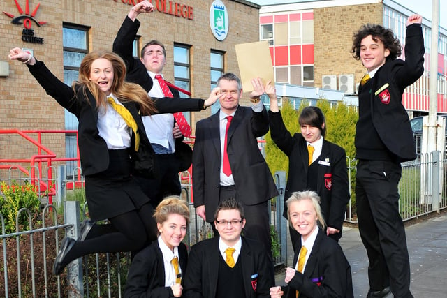 English Martyrs School deputy head teacher, Peter McMahon, celebrates with his pupils in 2012.