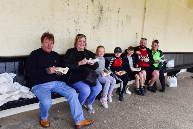 This family enjoying their fish and chips on Good Friday at the bus station in Seaton Carew.