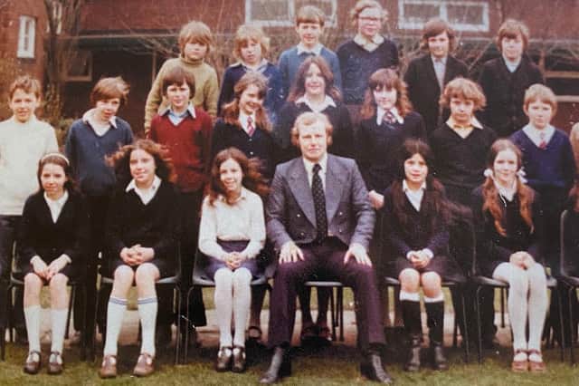 Mr Ridley with students in 1974.