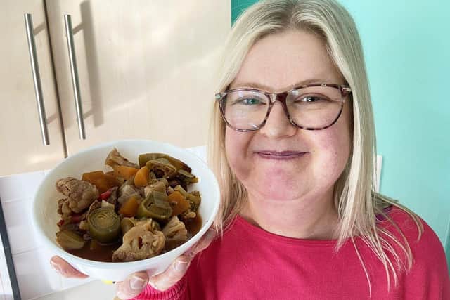 Slimmer Emma Wallace with a plate of her home made stew. Picture by FRANK REID.