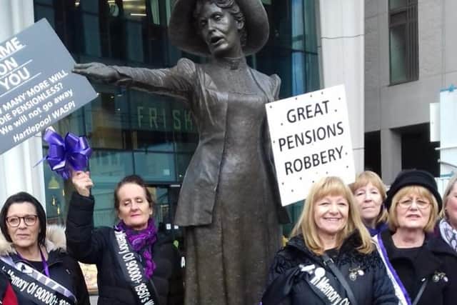 Members of Hartlepool WASPI Supporters Group at the unveiling of a plaque in memory of thousands of women who died while missing out on their pension at the Emmeline Pankhurst statue in Manchester.
