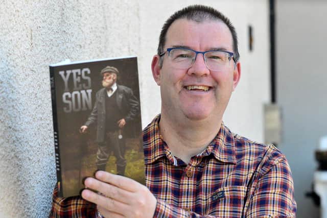 Gary Baker with his new book Yes Son. Picture by FRANK REID