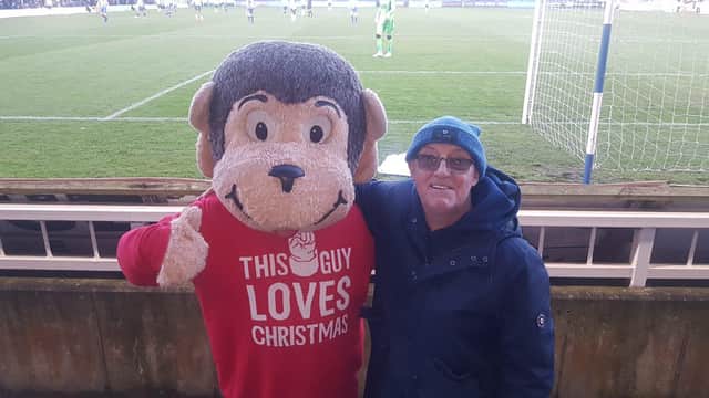 Howard Prosser remained a huge Hartlepool United fan even after he emigrated. Here he is at a game with mascot H'Angus.